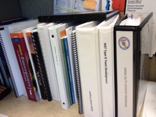 A stack of binders placed side by side